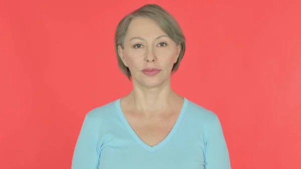 Serious Senior Old Woman Red Background — 图库照片