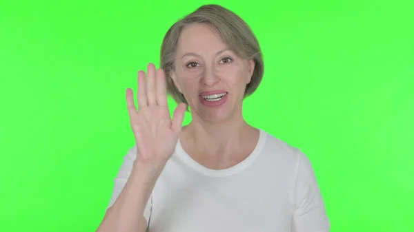 Senior Old Woman Talking Video Call Green Background — Stockfoto