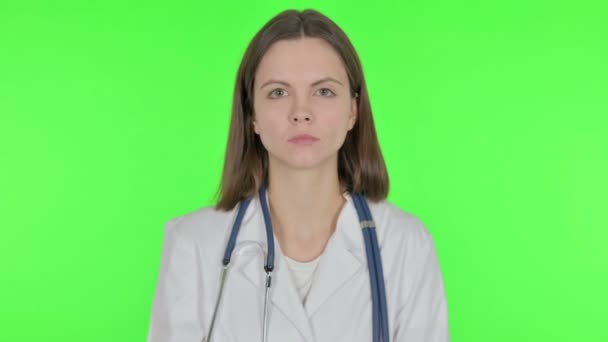 Restricting Young Doctor Denying Gesture Green Background — Stock Video
