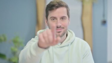 Portrait of Inviting Young Adult Man in Office