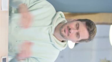 Vertical Video of Tired Young Adult Man with Headache, Migraine