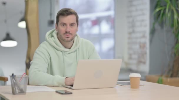 Young Adult Man Shocked While Working Laptop — Stock Video