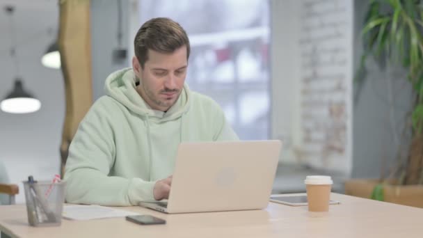 Young Adult Man Coughing While Working Laptop — Video Stock