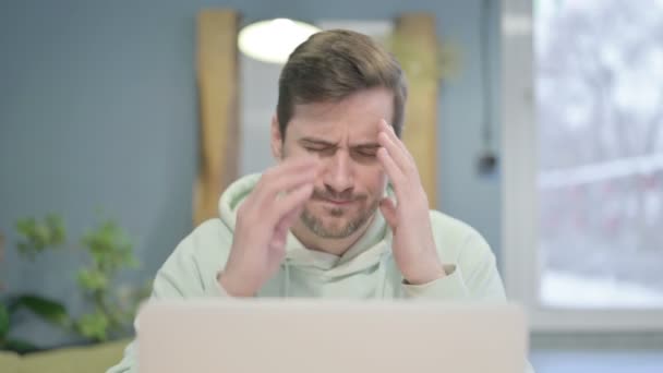 Close Young Adult Man Having Headache While Working Laptop — 图库视频影像