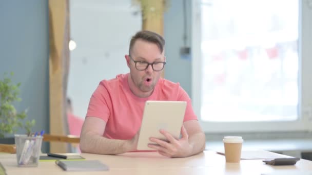 Shocked Young Adult Man Reacting Loss Digital Tablet — Stockvideo