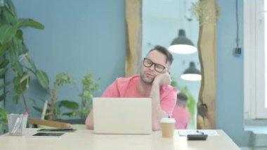 Creative Senior Old Man Sleeping while Working on Laptop