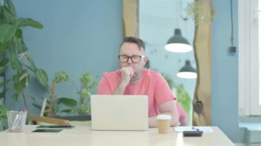 Coughing Sick Creative Senior Old Man Working on Laptop