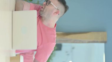 Vertical Video of Senior Old Man having Back Pain at Work