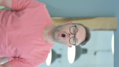 Vertical Portrait of Senior Old Man Celebrating Success