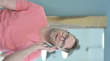 Vertical Portrait of Senior Old Man Talking on Phone