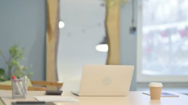 Senior Old Man Coming to Work on Laptop