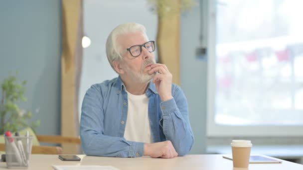Brainstorming Senior Old Man Thinking While Sitting Office — Stockvideo