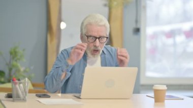 Senior Old Man Reacting to Online Loss on Laptop