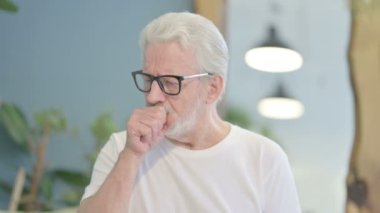 Portrait of Senior Old Man suffering with Cough