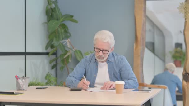Senior Old Man Doing Paperwork Calculating Report — Stock video