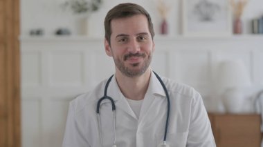 Portrait of Male Doctor Shaking Head as Yes Sign, Approval