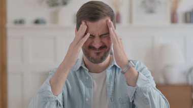 Sıradan bir adamın baş ağrısı portresi