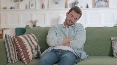 Sleepy Casual Man Taking Nap While Sitting in Office