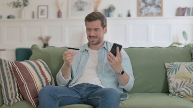 Casual Man Unsuccessful Online Payment on Smartphone