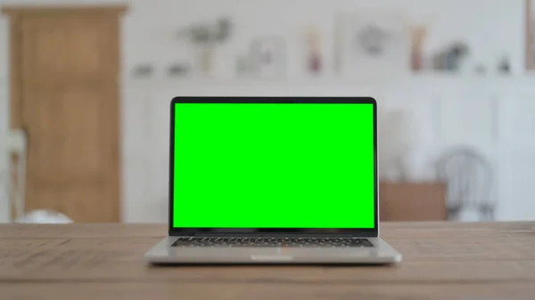 Open Laptop with Green Screen on Desk, Chroma Key