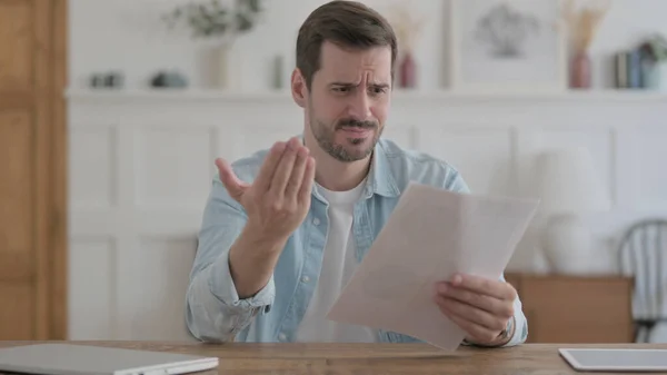 Casual Man Upset While Reading Documents Office — Stockfoto