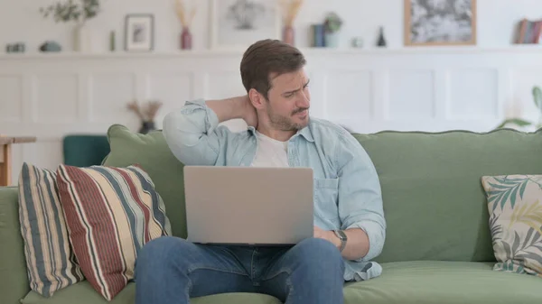 Casual Man Laptop Having Neck Pain Sofa — Stock Photo, Image