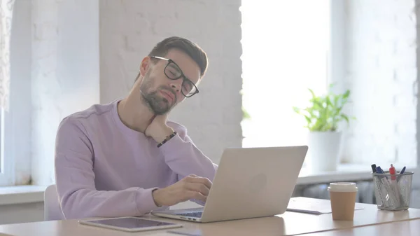 Young Adult Man Having Neck Pain While Using Laptop — Stock Photo, Image