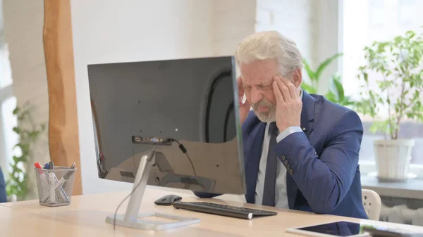 Old Businessman Having Headache While Working Computer — Stok fotoğraf