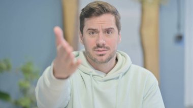 Distraught Young Adult Man Talking in Anger and Stress