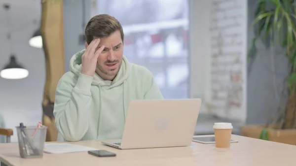 Young Adult Man Reacting Loss While Working Office — Stok fotoğraf