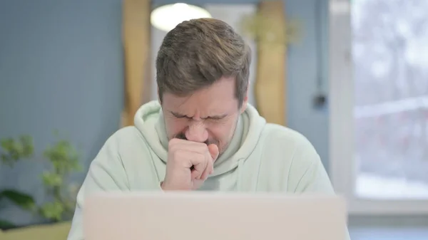 Close Young Adult Man Coughing While Working Laptop — Stock fotografie