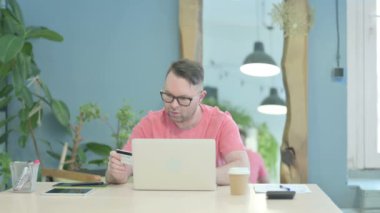 Creative Adult Man Unable to make Online Payment on Laptop