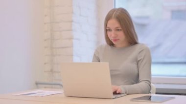 Creative Young Woman Reacting to Online Loss on Laptop