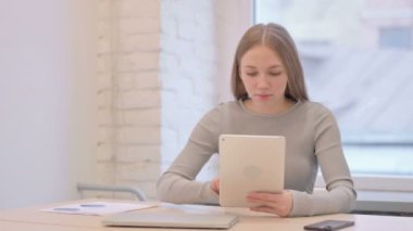 Excited Creative Young Woman Cheering Win on Digital Tablet