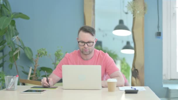 Creative Male Graphic Designer Working Laptop Graphic Tablet — Stock videók