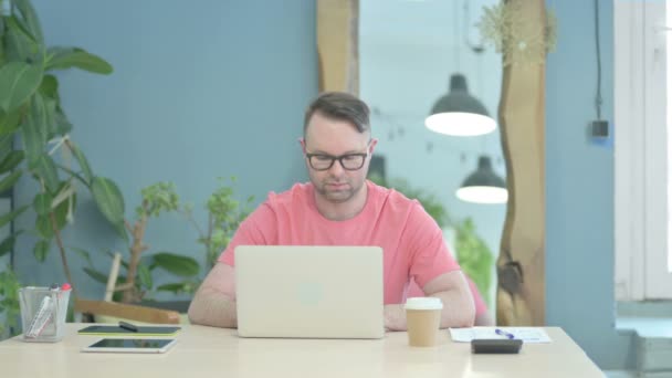 Creative Adult Man Shaking Head Rejection While Working Laptop — Stockvideo