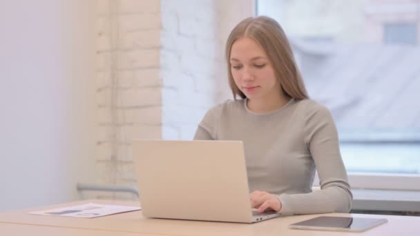 Creative Young Woman Looking Camera While Using Laptop — Stok video