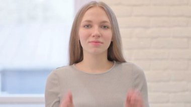 Excited Young Woman Clapping, Applauding for Team