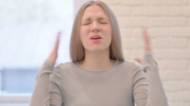 Portrait of Creative Young Woman Reacting to Loss