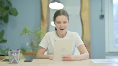 Young Woman Talking for Online Video Chat via Tablet Computer