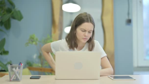Young Woman Having Back Pain While Sitting Work — Stock Video