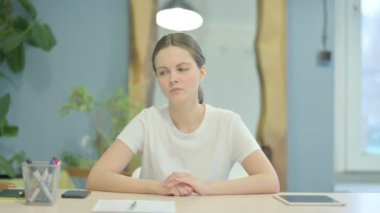 Young Woman Leaving Office after Work