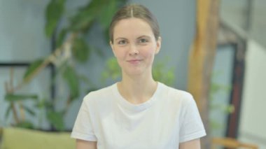 Portrait of Young Woman Waving Hand, Hello