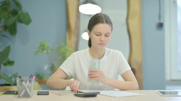 Young Woman Doing Calculations Work — Stok video