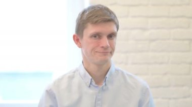 Portrait of Disliking Young Businessman Feeling Displeased