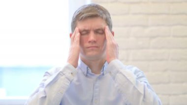 Migraine, Tired Young Businessman with Headache