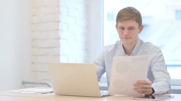 Young Businessman Feeling Upset While Doing Paperwork Office — Stock Video