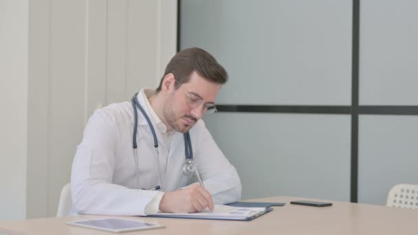 Doctor Working Documents Clinic Paperwork — Stock Video