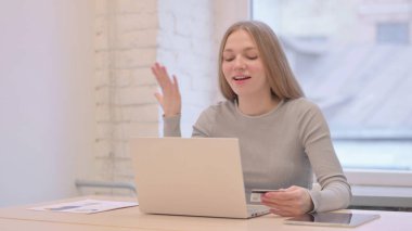 Excited Creative Young Woman Shopping Online with Debit Card