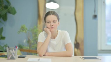 Young Woman Leaving Office after Work